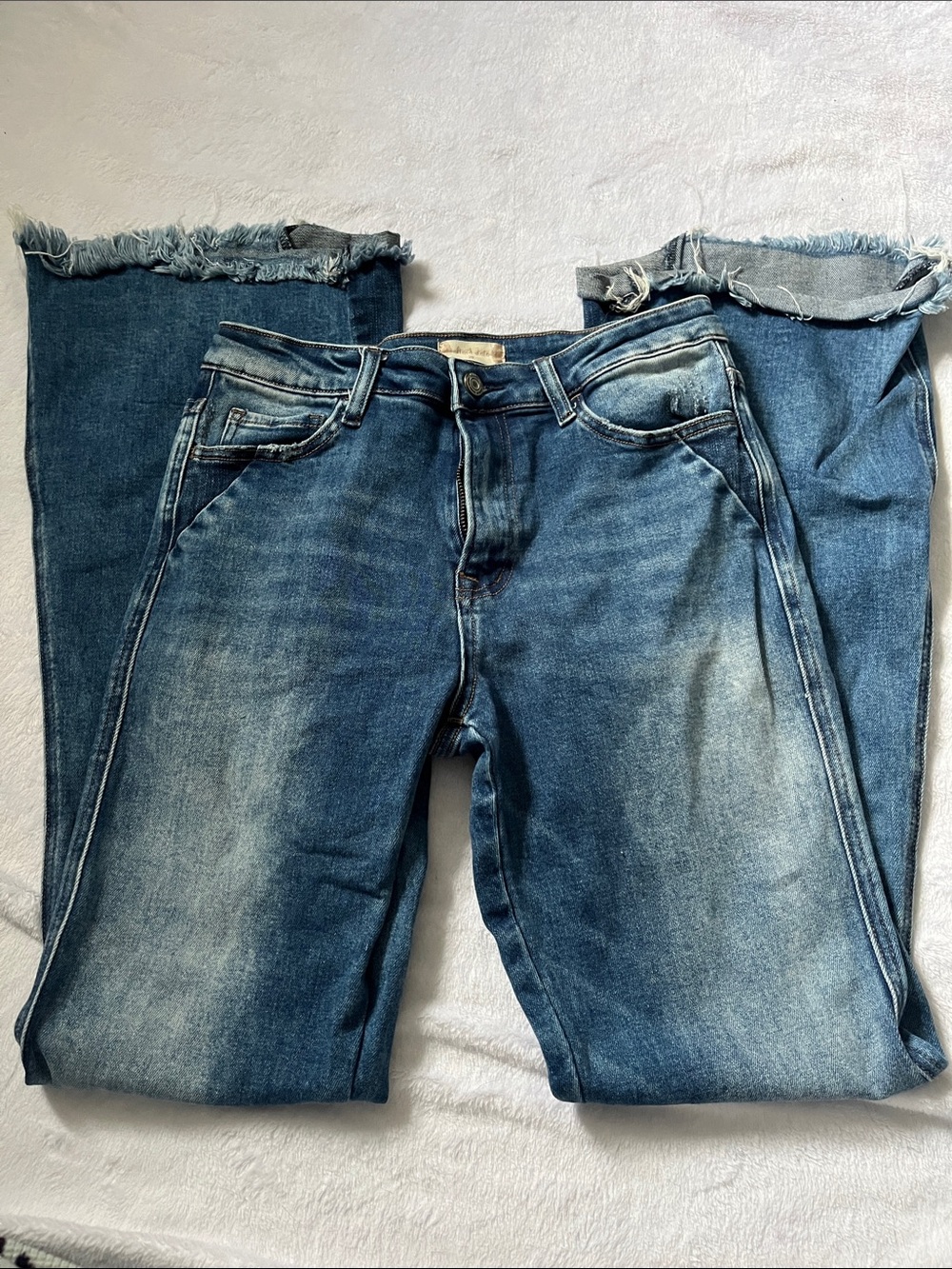 Altar'd State Medium Wash Flare Jeans with Frayed Hem